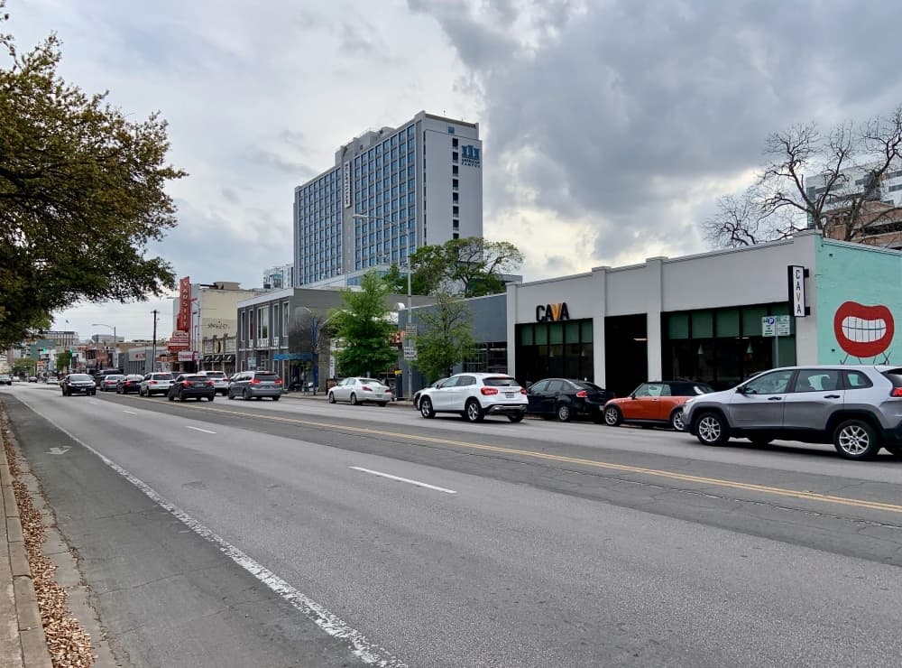 Some businesses along The Drag near The University of Texas have not yet noticed a decline in business since the campus closed March 13 to reduce the spread of coronavirus. (Chase Karacostas/Community Impact Newspaper)