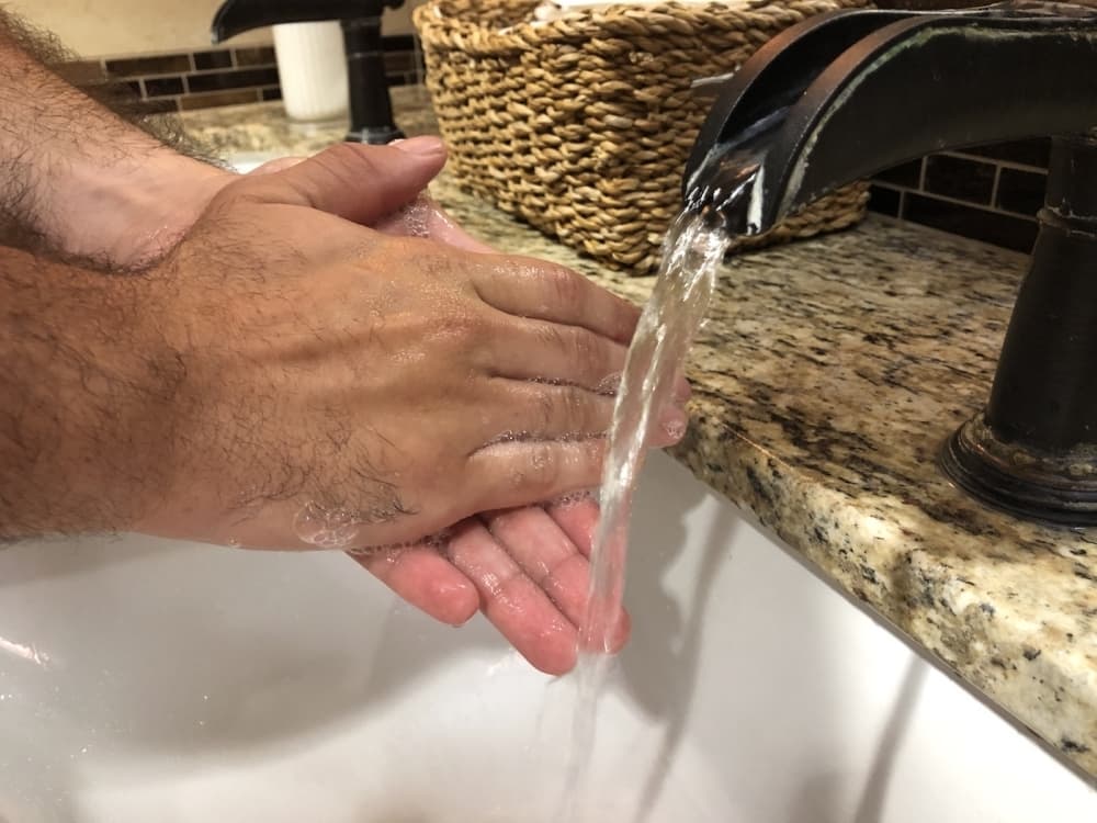Washing hands often with soap and water for at least 20 seconds and social distancing could help stop the spread of coronavirus. (Jack Flagler/Community Impact Newspaper)