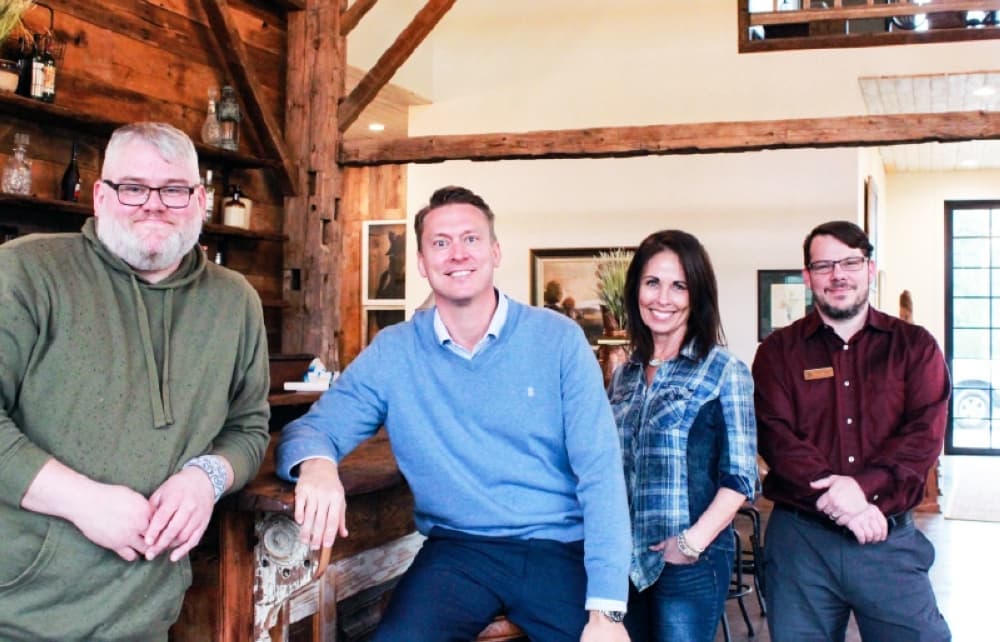 From left: Josh Slaughter, Michael Bradbury, Jodie Schrier and Brian Monaco run the Historic Hill House + Farm. (Andy Li/Community Impact Newspaper)