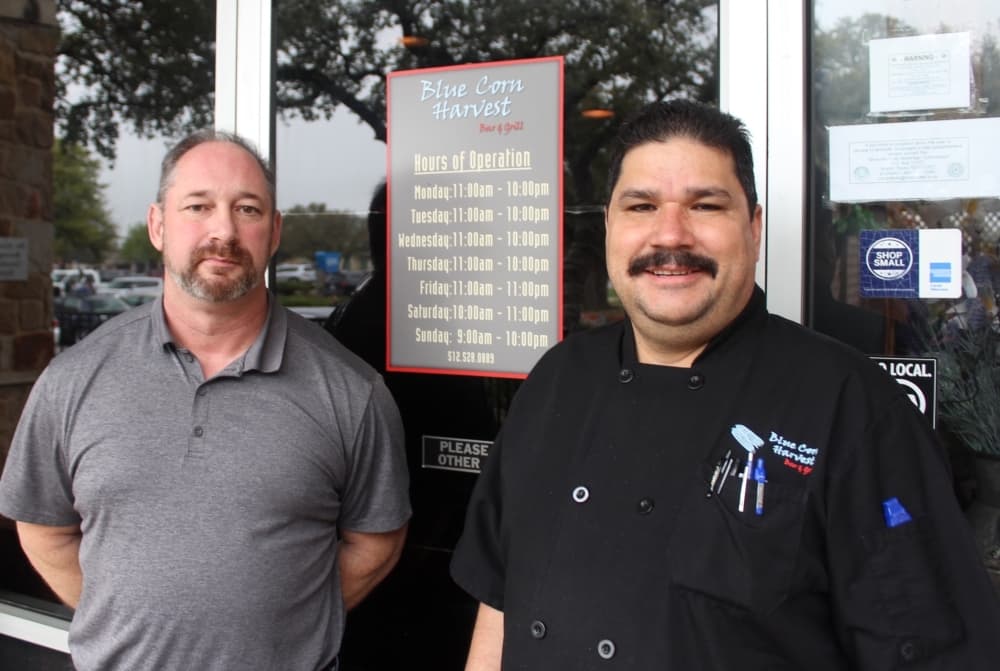 Operations manager James Odendahl and co-owner Santos Garcia said Blue Corn Harvest in Cedar Park is open for both curbside and dine-in business. (Brian Perdue/Community Impact Newspaper)