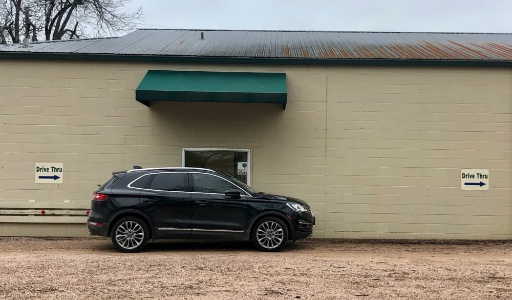 Gus's Drug offers drive through and free delivery services. (Sally Grace Holtgrieve/Community Impact Newspaper)