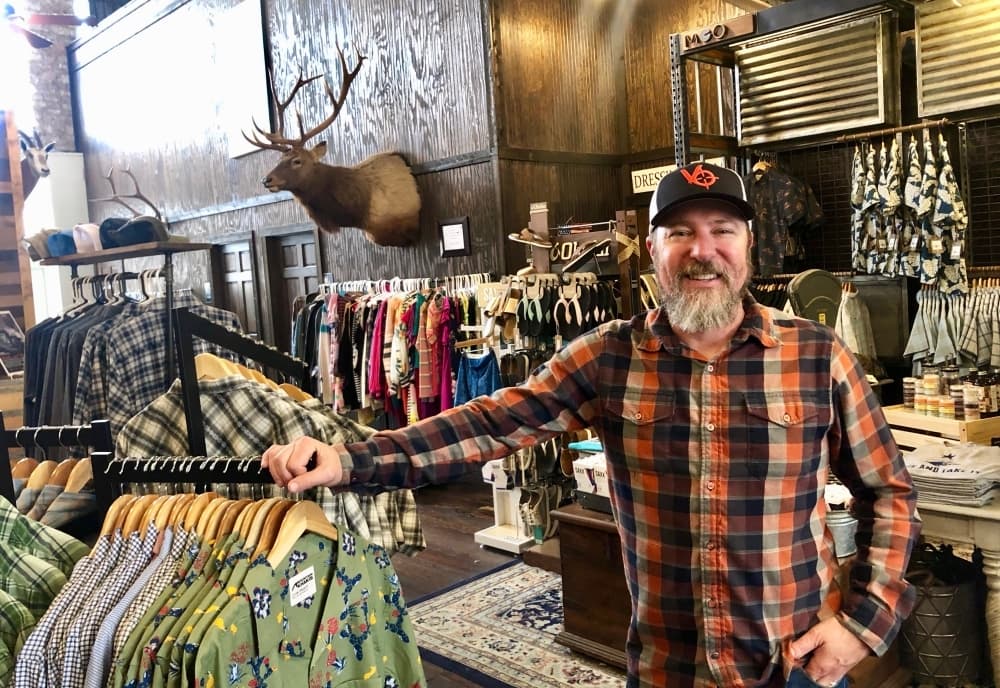 Mesquite Creek Outfitters Owner Cody Hirt plans make merchandise—along with beer and wine—available for delivery. (Sally Grace Holtgrieve/Community Impact Newspaper)