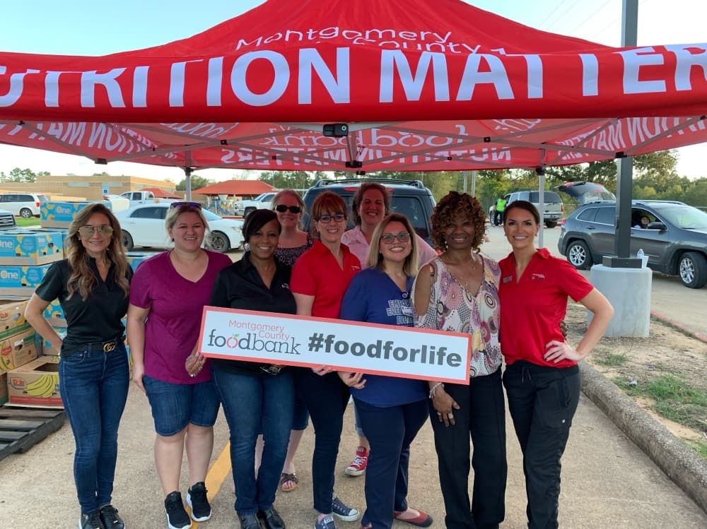 Staff take part in mobile distribution efforts. (Photo by Montgomery County Food Bank)