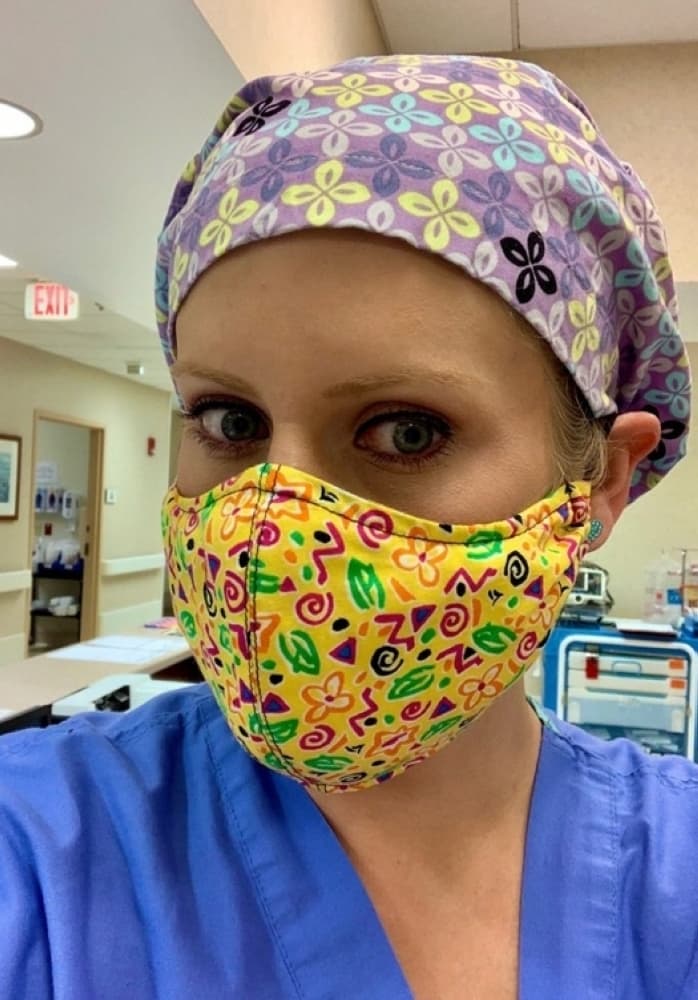 A nurse sent Must Love Fabric owner Phyllis Lively a photo of herself wearing one of the medical masks Lively's team of volunteers made. (Courtesy Must Love Fabric)