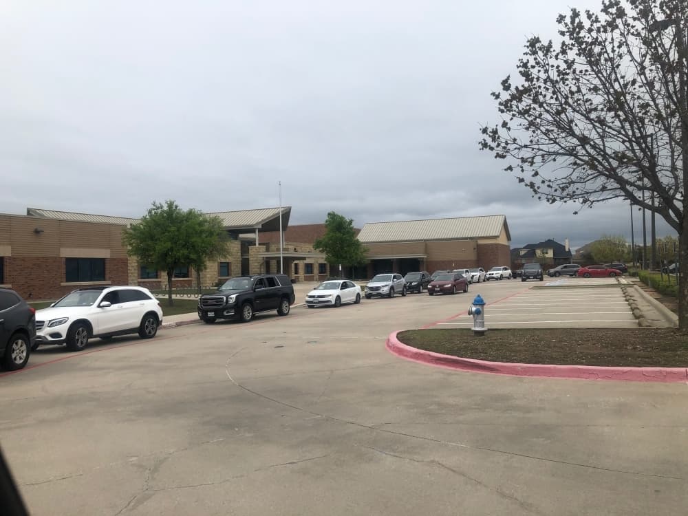 Robertson Elementary School teachers first met at the school in their own cars before the car parade. In order to practice social distancing, the teachers did not exit their cars. (Courtesy Kyla Prusak)