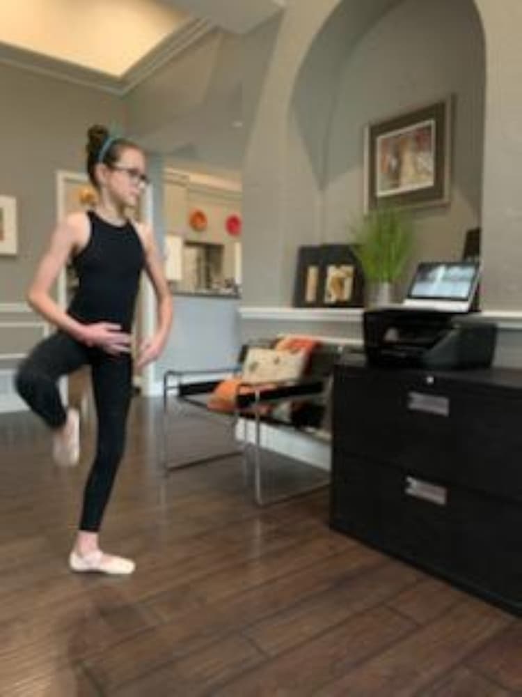 Luci Aldaz practices along with an online video from 4 the Love of Dance. (Courtesy Gina Aldaz)