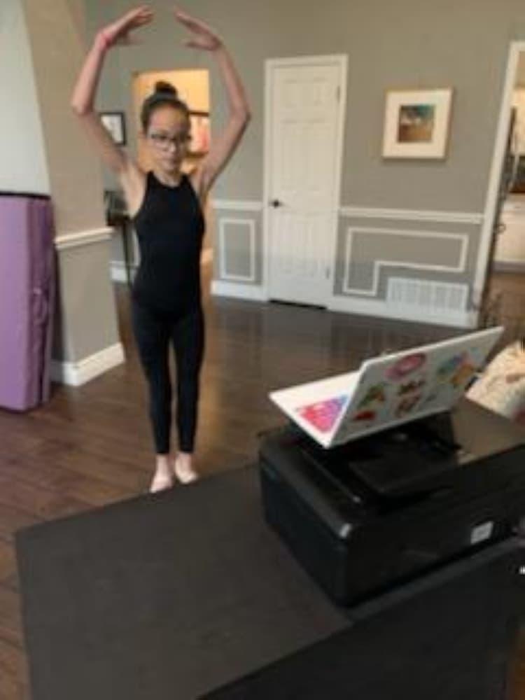 Luci Aldaz practices along with an online video from 4 the Love of Dance. (Courtesy Gina Aldaz)