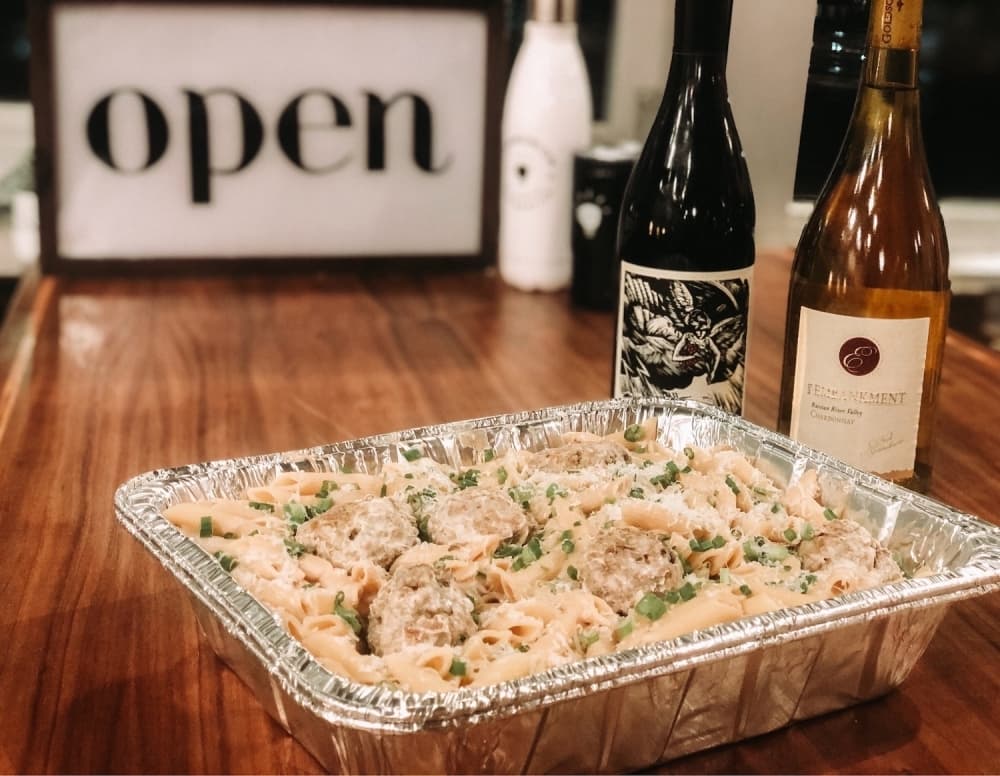 Subscribers to the 400 for 500 campaign will receive six family-style meals. Bottles of wine are also available to-go. (Courtesy Communion Neighborhood Cooperative)