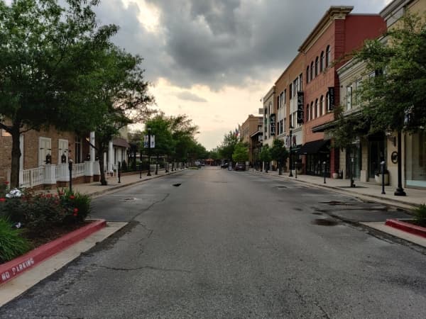 Market Street's stores, streets and parking spaces were empty the week of March 23. (Ben Thompson/Community Impact Newspaper)