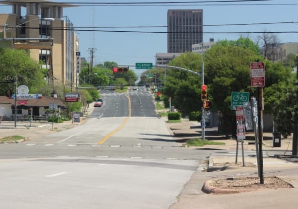 Austin's 12th Street sits nearly empty March 25 after the city and county's stay-at-home orders took effect. (Christopher Neely/Community Impact Newspaper)