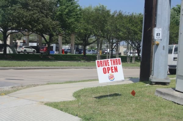Fast-food dining rooms are closed to the public, but individuals throughout the county can still take advantage of drive-thru services. (Danica Smithwick/Community Impact Newspaper)