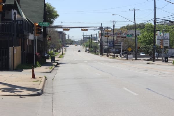 North Lamar near the intersection of 13th Street was barren March 25, the first day of Austin's stay-at-home order. (Christopher Neely/Community Impact Newspaper)