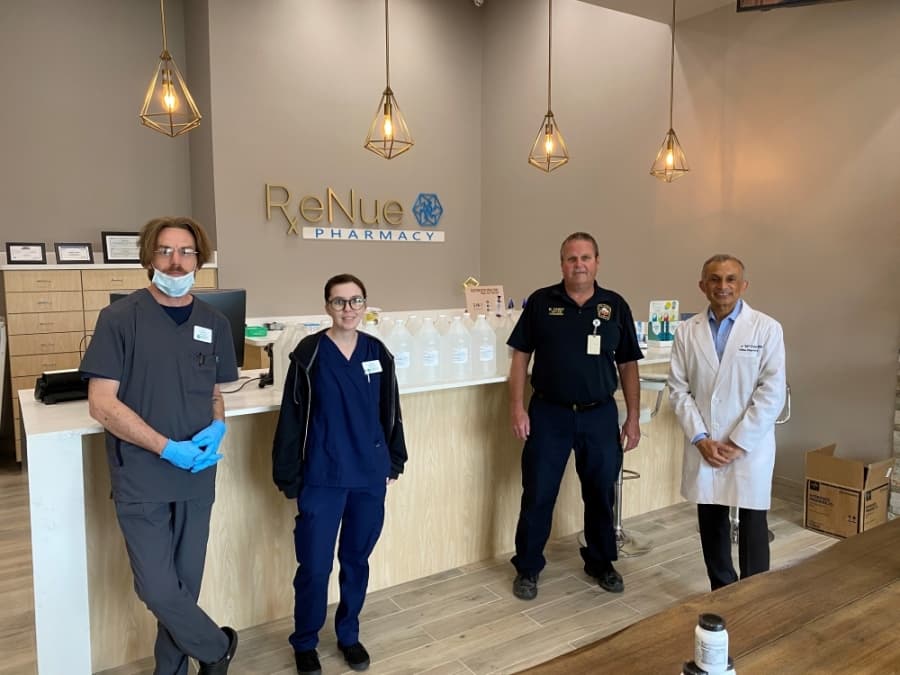 Plano Fire-Rescue recently picked up a donation of 20 one-gallon bottles of hand sanitizer from ReNue Pharmacy. (Courtesy ReNue Pharmacy)