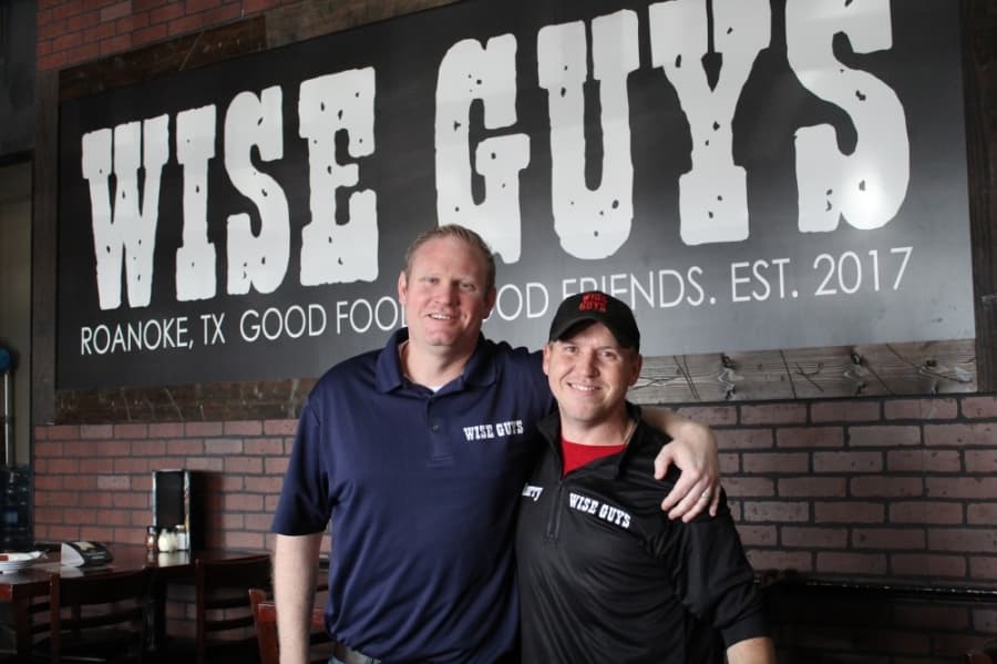 Wise Guys Pizzeria owners Kevin McNamara (left) and Larry McCain said they know all of the ins and outs of the business. (Ian Pribanic/Community Impact Newspaper)