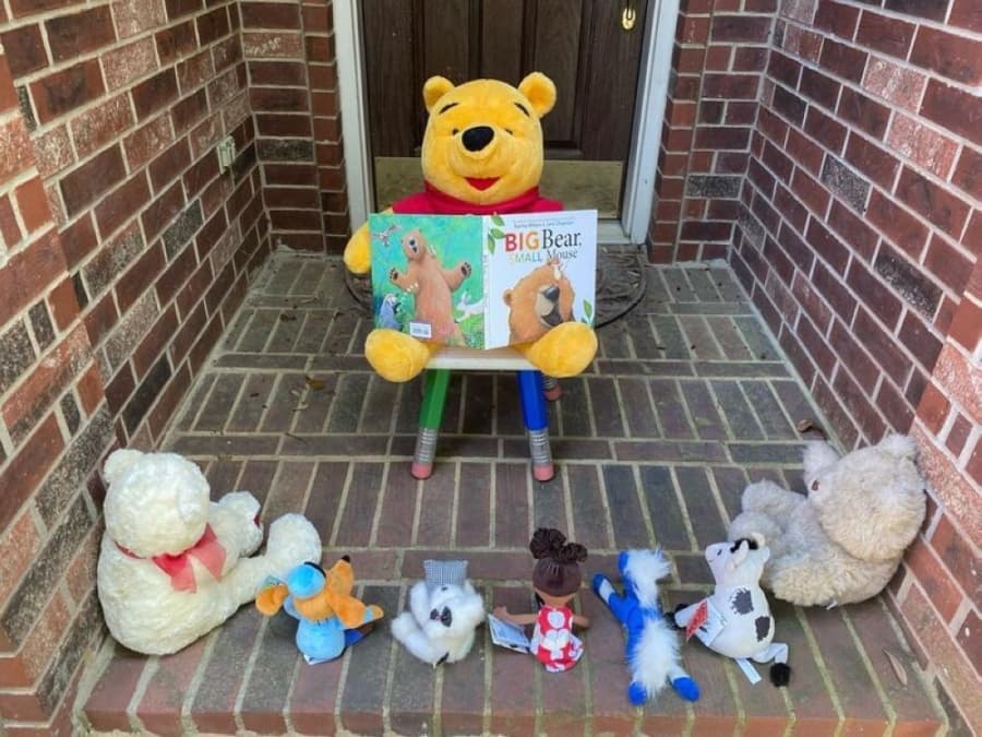 Menchaca Elementary School librarian Rita Painter set a display of a stuffed Winnie The Pooh reading a book to friends to remind her students to continue to read stories while not at school. (Courtesy Rita Painter)