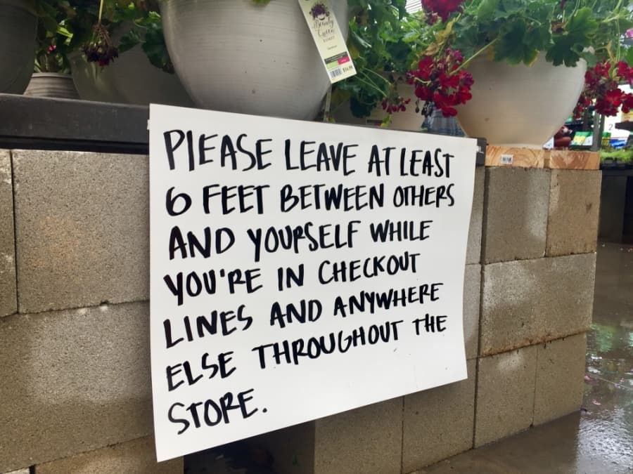 Area stores, including Lowes in Round Rock, have installed signage to encourage shoppers to practice social distancing. (Taylor Jackson Buchanan/Community Impact Newspaper)