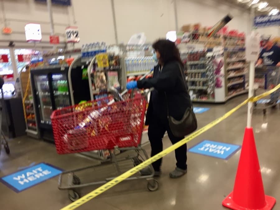 As health guidelines around wearing masks in public have shifted over recent days, shoppers don cloth face protection. (Taylor Jackson Buchanan/Community Impact Newspaper)