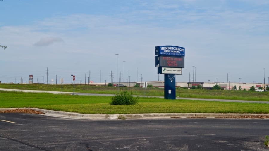 Electronic messages at Hendrickson High School in Pflugerville reference students' tentative spring break return date. School closures have extended state-wide through May 4. (Kelsey Thompson/Community Impact Newspaper)