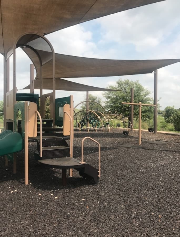 Central Park's playground in Bee Cave was unused on March 27. (Amy Rae Dadamo/Community Impact Newspaper)