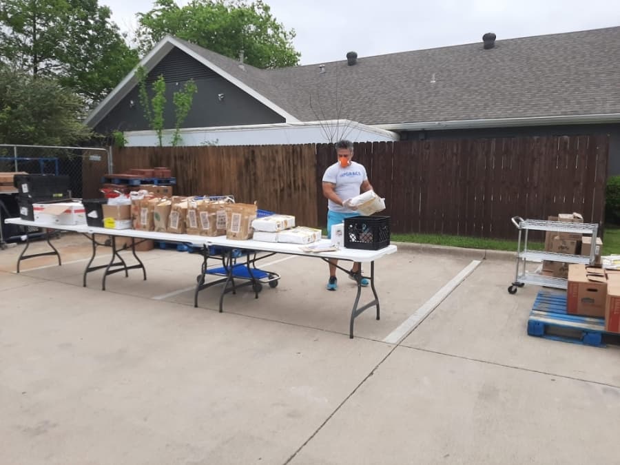 GRACE workers wear masks while assisting with the drive-thru line for the food pantry. (Courtesy GRACE)