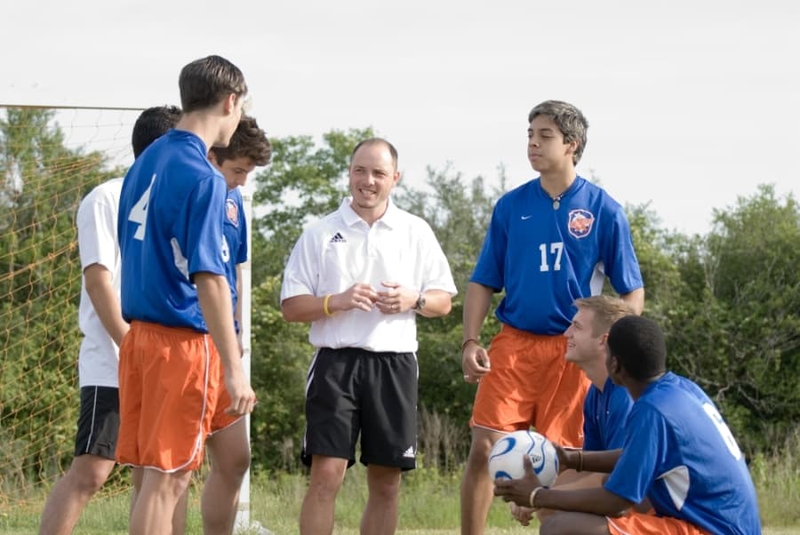 Ronnie Nespeca (center) helped develop the college's soccer team in 2004 and led the team as head coach through 2016. (Courtesy Lone Star College)