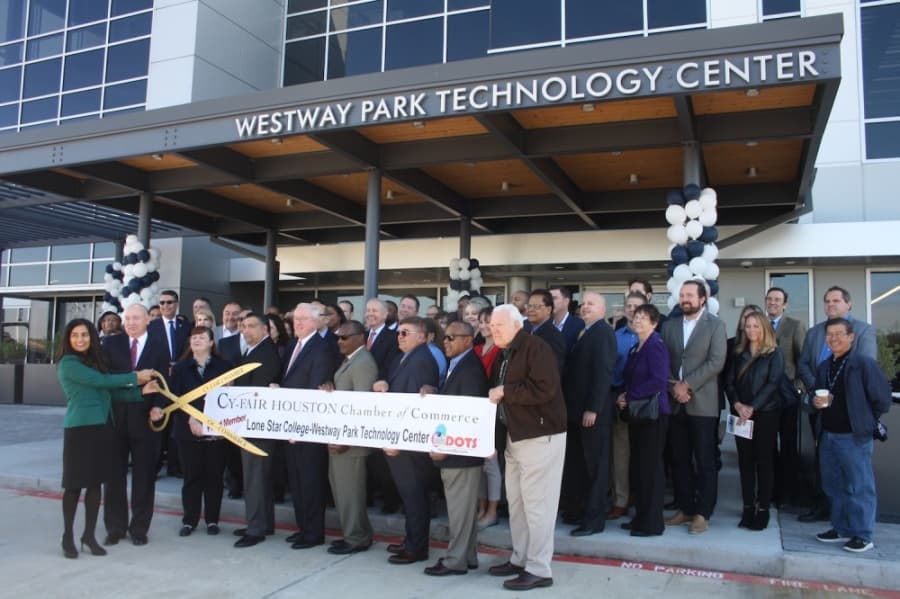 President Seelpa Keshvala (left) and faculty members celebrate the opening of the Westway Park Technology Center in January 2019. (Danica Smithwick/Community Impact Newspaper)