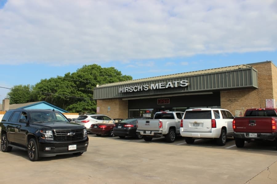 Cars pack the parking lot of Hirsch's Meats in Plano the Saturday before Easter. (Daniel Houston/Community Impact Newspaper)