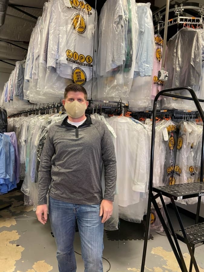A photo of Jason Frick wearing a mask