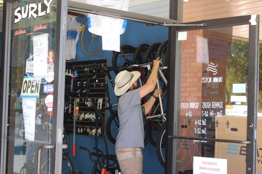 Tailwind Bicycles in Kingwood has been busy since stay-at-home orders were issued. On April 15, customers lined up to get their bikes repaired. (Kelly Schafler/Community Impact Newspaper)