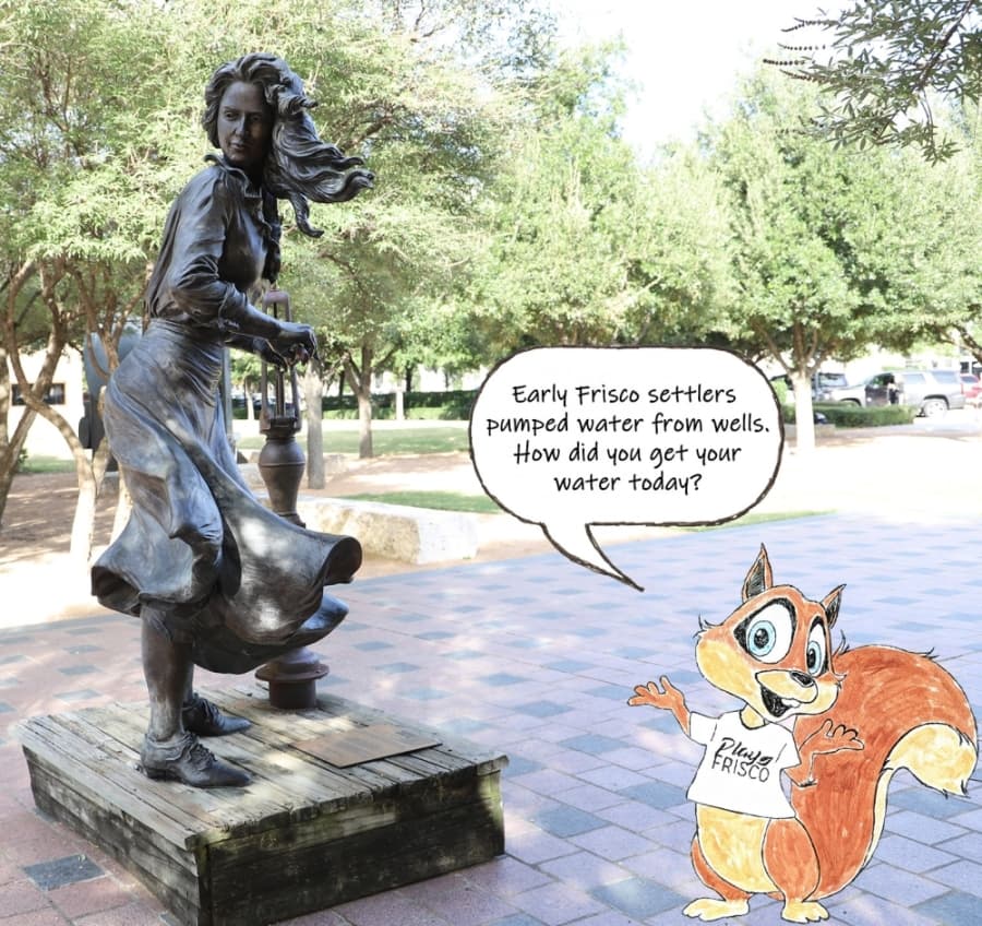 Walnut the squirrel visits "Fetching Water" by Janice Hart Melito at the George A. Purefoy Municipal Center. (Courtesy Play Frisco)