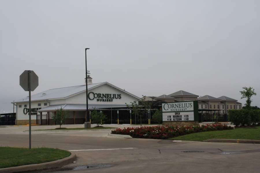 Signage at Cornelius Nursery at 1403 Westborough Drive, Katy, states it is still open for customers. (Jen Para/Community Impact Newspaper)