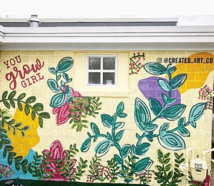 The "You grow Girl" mural was inspired by the floral vendor at the Darling Co. (Courtesy the Darling Co.)