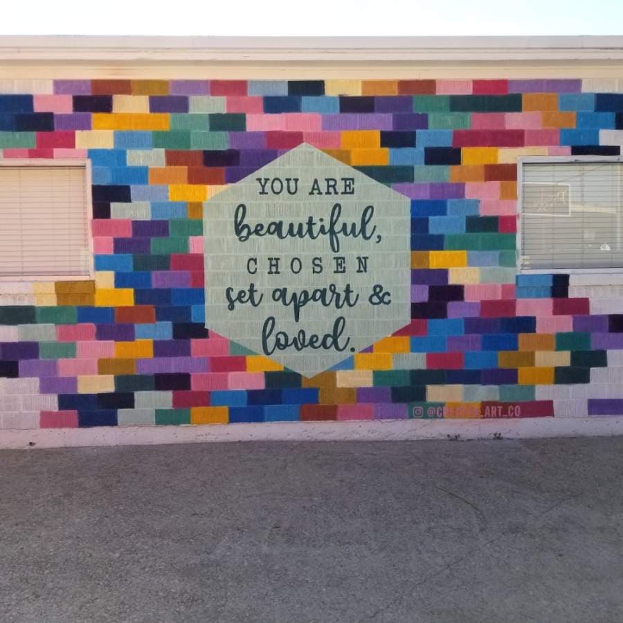 The Darling Co. founder Laci Coker said "You are beautiful" mural represents her Christian beliefs. (Courtesy Amy Alexander)