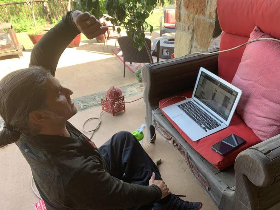 A photo of Thomas Leverett conducting a class virtually