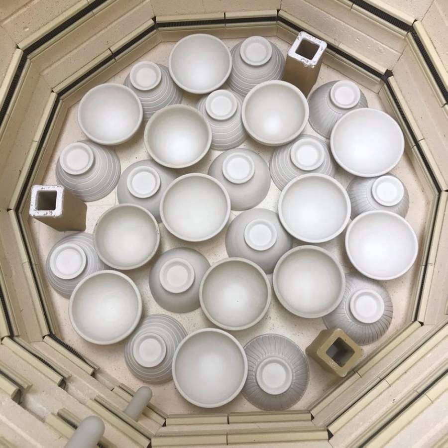 An electric kiln is full of sample bowls at Twisted Clay Studio. (courtesy Twisted Clay Studio)