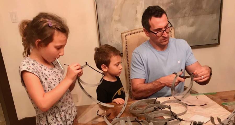 Bellaire families pitched in to create 500 face shields that have gone to local healthcare workers. Courtesy Hannah Nates
