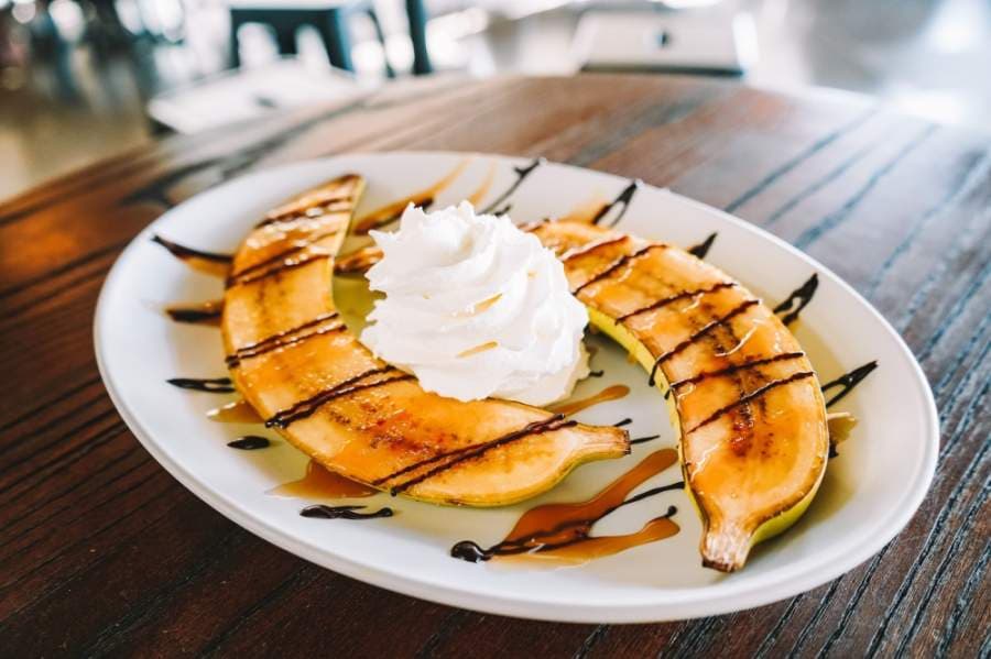 The Banana Bengals dish ($5) features brown sugar-bruléed fresh bananas with chocolate, caramel and whipped cream. (Courtesy Duino Coffee)