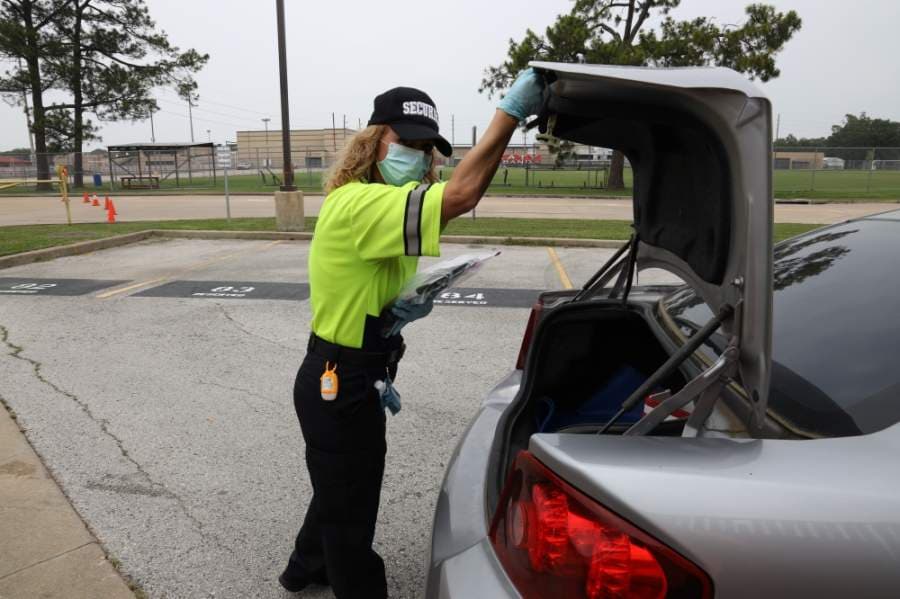 Katy ISD staff members distribute technology devices for students on April 22. (Courtesy Katy ISD)