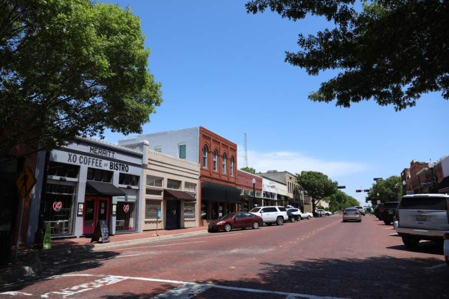 Cars parked in downtown Plano on April 24 show signs of people returning to public spaces. (Liesbeth Powers/Community Impact Newspaper)