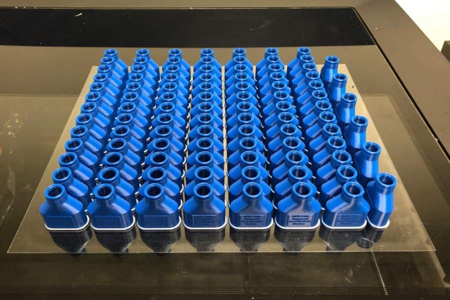 A batch of adapters used to convert snorkeling masks to N95s are printed at UT Dallas. (Courtesy James Griffin)