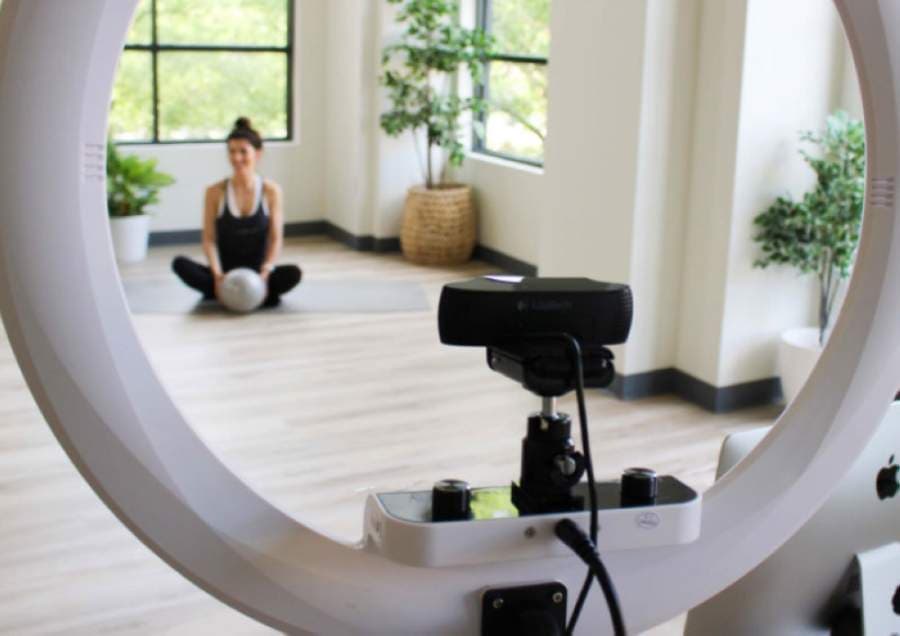 Sowydra streams workouts to clients. (Kelly Schafler/Community Impact Newspaper)