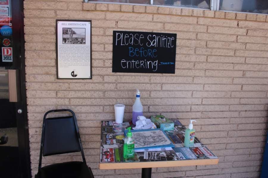 Diners are encouraged to use hand sanitizer outside Bill Smith's Cafe before venturing in. (Miranda Jaimes/Community Impact Newspaper)