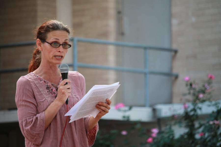 Angela Daniel said she organized the protest to shine a light on what she called the "draconian measures"  she believes the government is taking during the coronavirus outbreak. (Andy Li/Community Impact Newspaper)