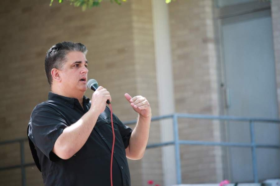 Jon Bouche, former candidate for county chair of the Republican Party, spoke during the protest. (Andy Li/Community Impact Newspaper)