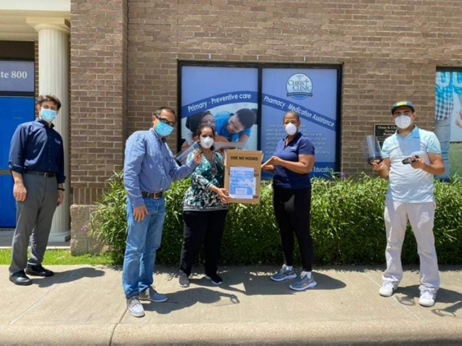 Harmony School of Innovation-Katy and Harmony Science Academy-Sugar Land gave 50 shields to Christ Clinic in the Katy area on May 4. (Courtesy Harmony Public Schools)