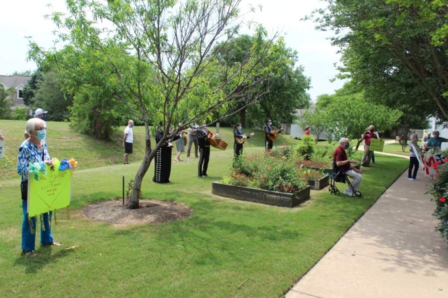 After well-wishers paraded by the couple, they spaced apart to listen to mariachi music. (Brian Perdue/Community Impact Newspaper)