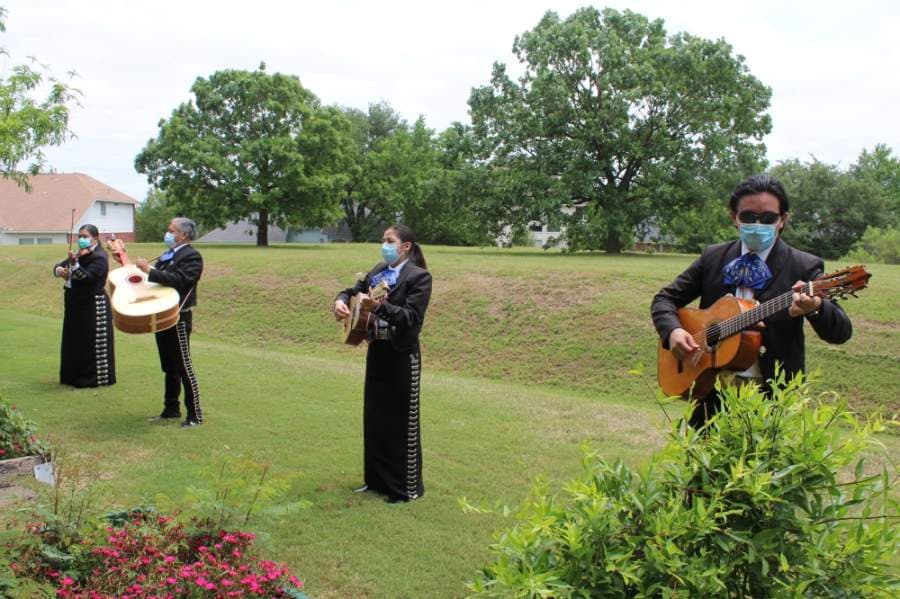 A mariachi band performs while practicing social distancing. (Brian Perdue/Community Impact Newspaper)