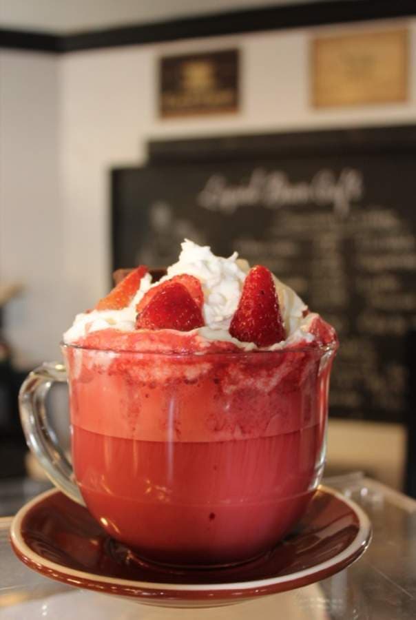 The White Chocolate Raspberry Latte ($5.50) is one of several espresso-based beverages created by the Liquid Bean Cafe baristas. (Hannah Zedaker/Community Impact Newspaper)