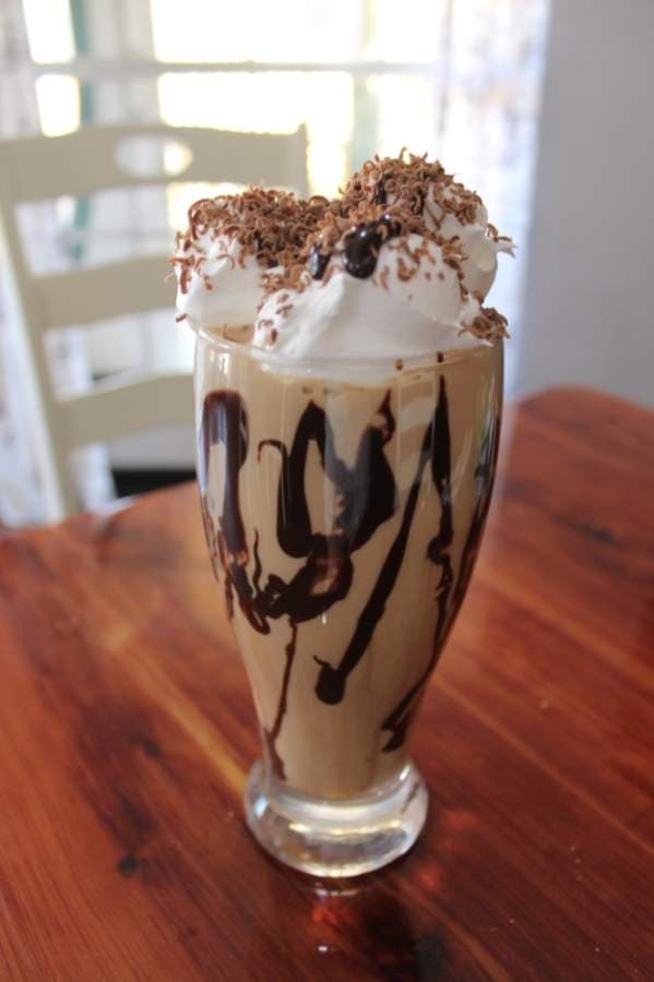 The Box of Chocolate Latte ($5.50) is one of several espresso-based beverages created by the Liquid Bean Cafe baristas. (Hannah Zedaker/Community Impact Newspaper)