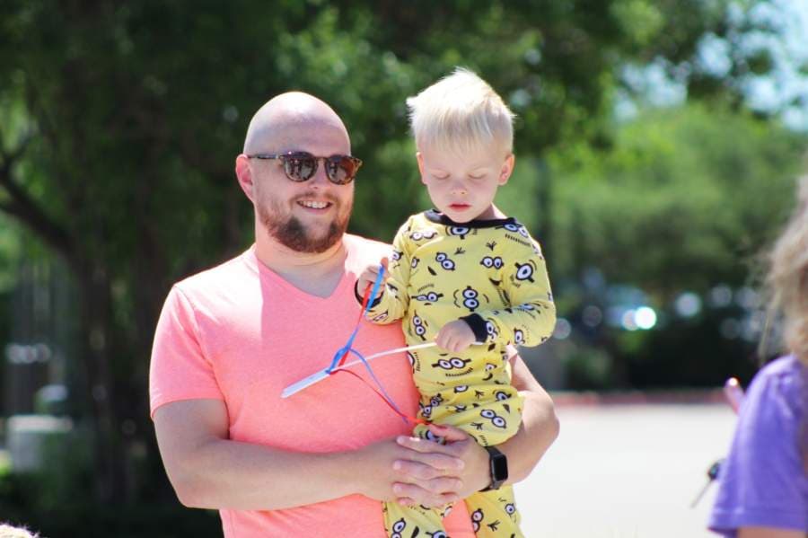 Dallas-Fort Worth residents of all ages were on hand at Texas Health Alliance hospital May 6 to witness a flyover by the U.S. Navy Blue Angels. (Ian Pribanic/Community Impact Newspaper)